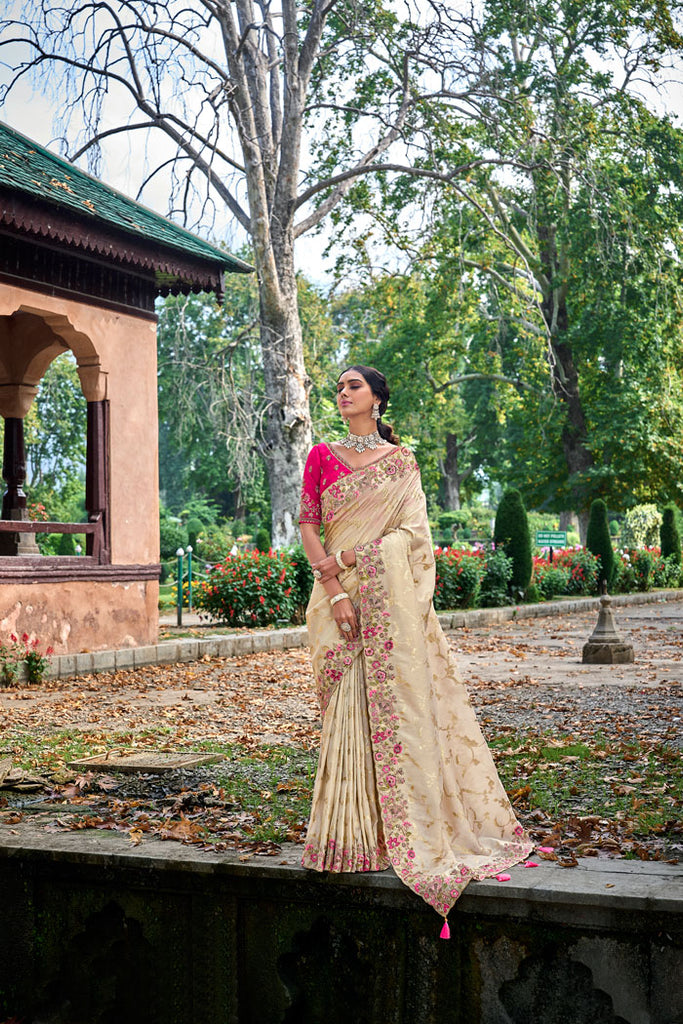 Premium Photo | A beautiful positive Indian girl in traditional national  clothes a saree and jewelry poses in a paradise flower garden