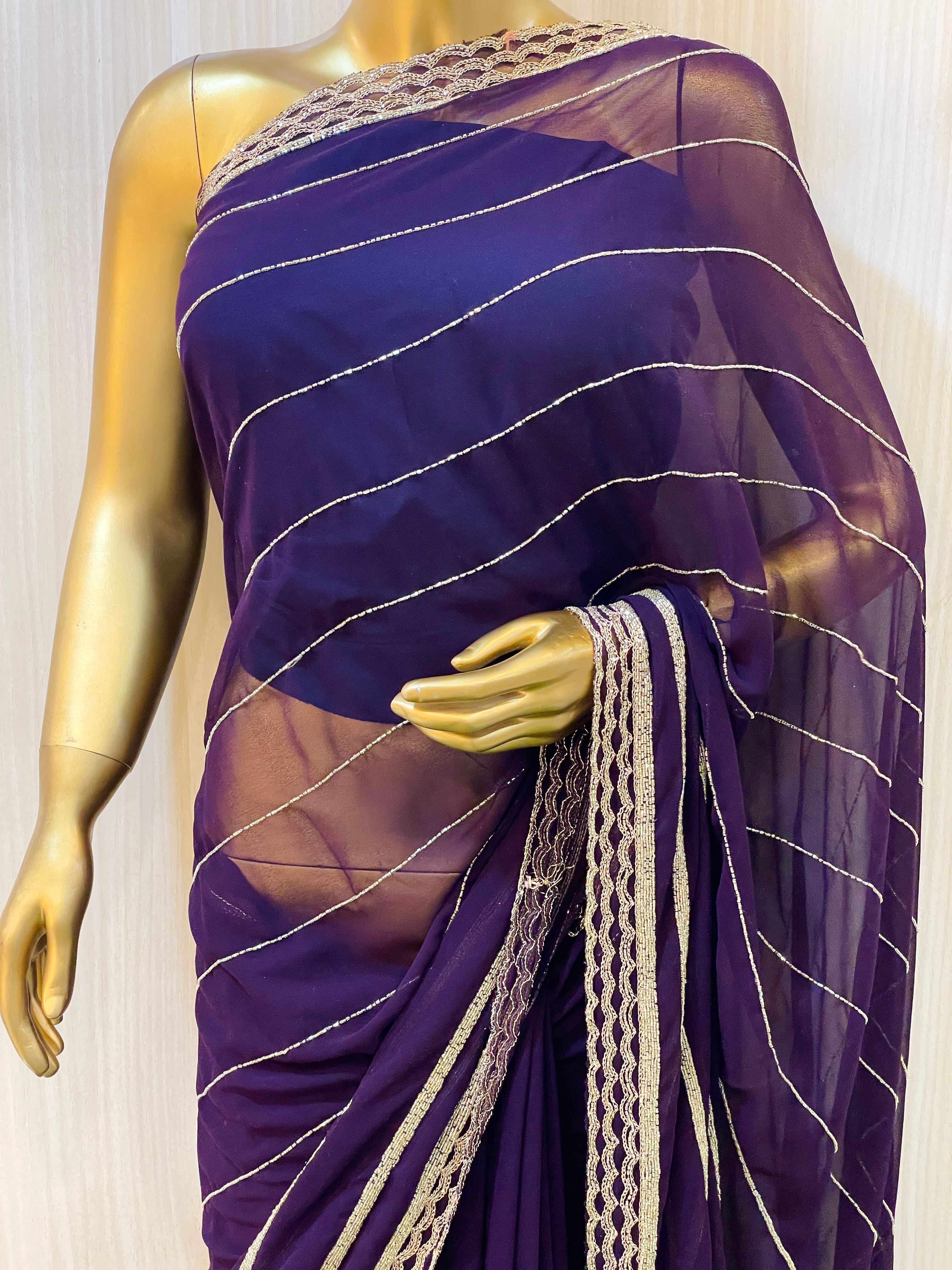 Vinisha Puple Georgette Saree